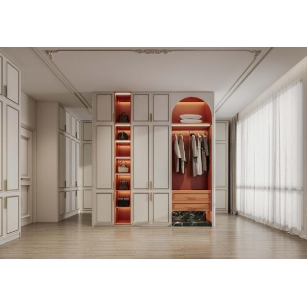 French Style Custom Walk-In Closet with Cream Doors & Gold Trim