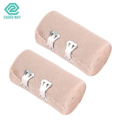 A pele coloriu a atadura de pingamento médica de Gauze Tape High Elastic Compression da fita com grampos