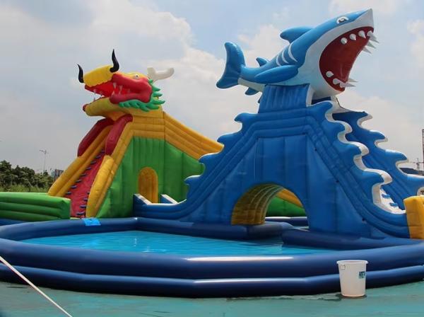14*18m Inflatable Water Park with 1200w Blower and 1-20 People Capacity Dragon Shark Slide and Large Swimming Pool