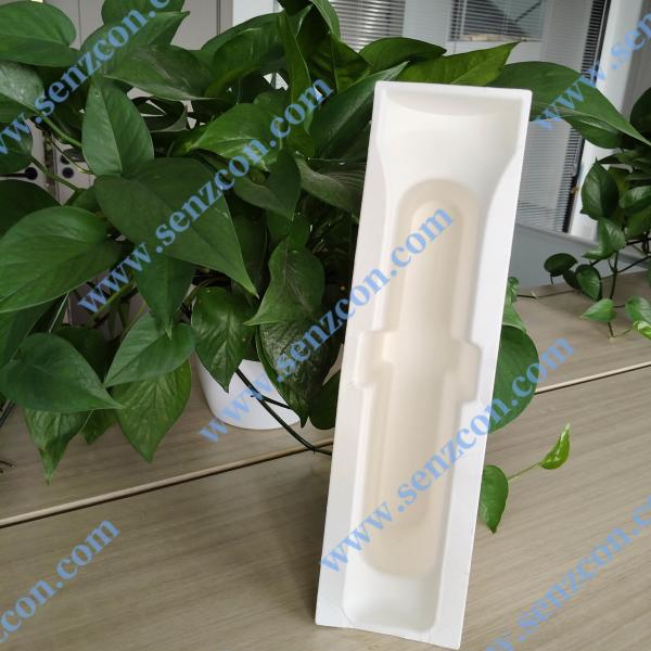 Paper pulp molding packaging for small household appliances. Foldable hair straighteners and hair curling irons. Environmentally friendly white paper pulp molding inner lining packaging.