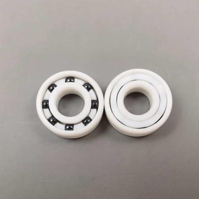 Las bolas PTFE del rodamiento de bolitas del nitruro de silicio ZrO2 Si3N4 enjaulan 6001 12m m