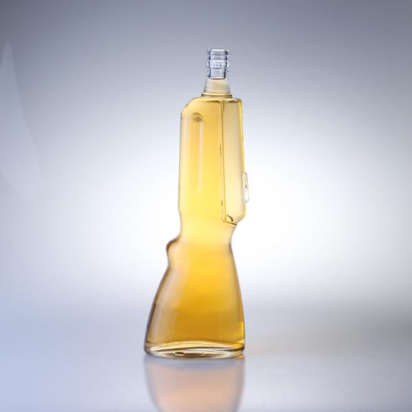 Botella de vidrio de whisky de 500 ml Con forma de pistola, molde abierto Botella de vodka de 700 ml para la industria de bebidas