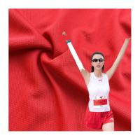 Tissu massif à œil d'oiseau 100% polyester Tricot respirant pour le sport T-shirt