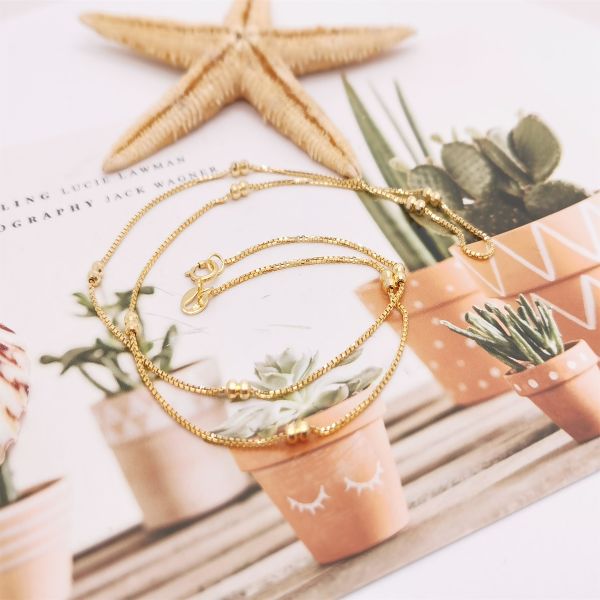 Encantador collar de oro amarillo de 18 quilates