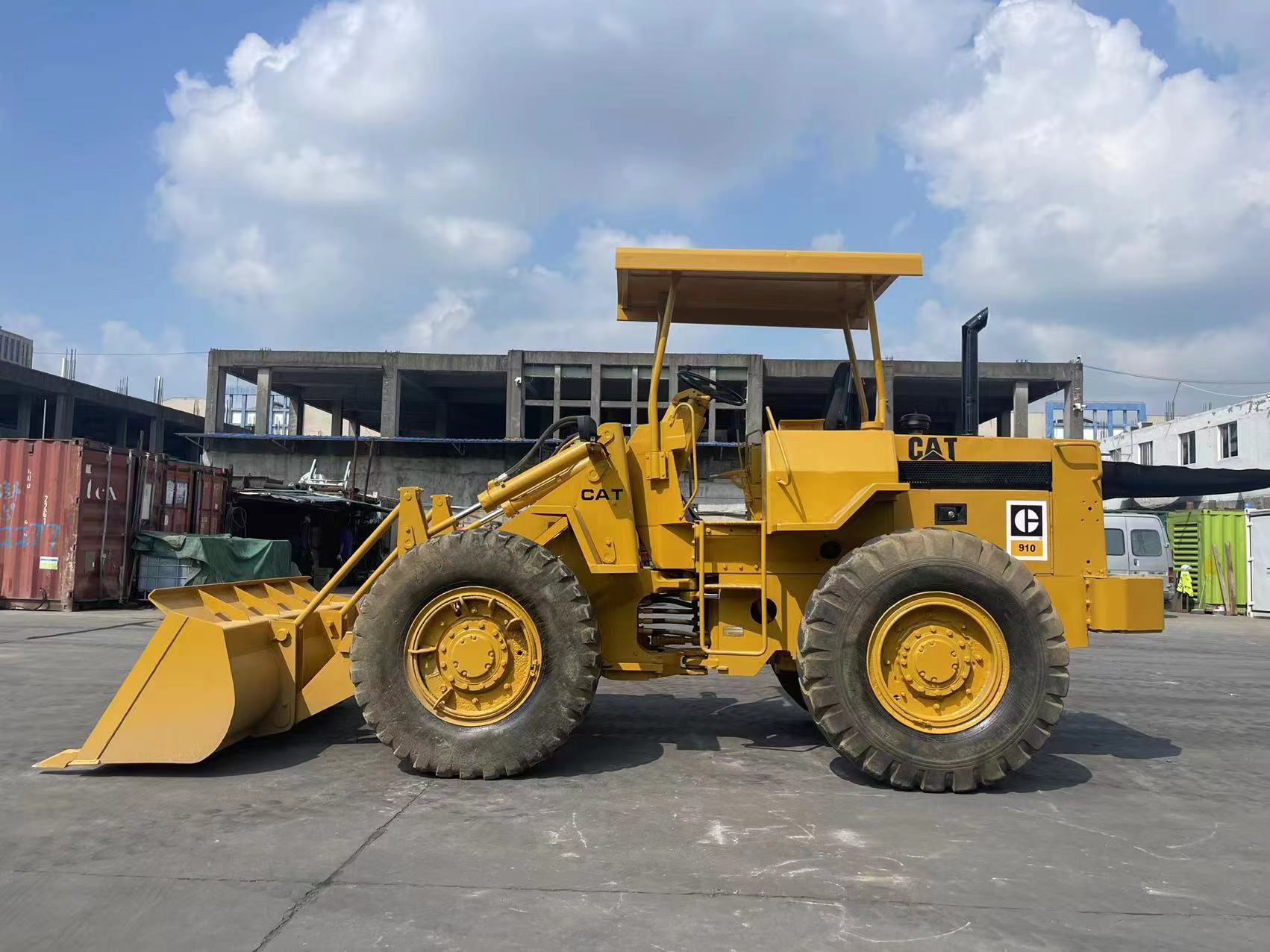 Подержанные Caterpillar 910 колесные погрузчики Cat