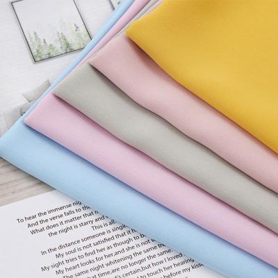 Material chiffon multicolorido do vestido 108gsm da tela 150cm do poliéster da tintura do laço do crepe