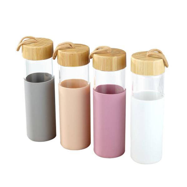 Custom 18oz Glass Water Bottles Reusable Glass Juice Bottles For Coffee Tea Water Juices With Lids