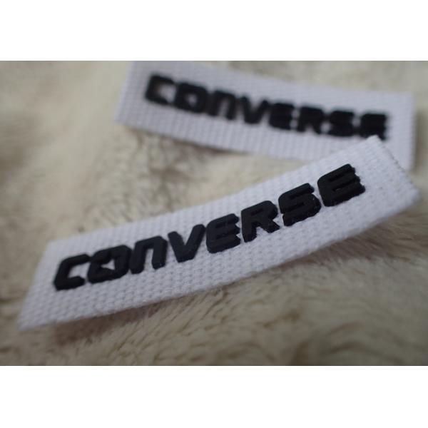 Противоположный логотип силикона 3Д латает черную нежность для ярлыка шеи одежды