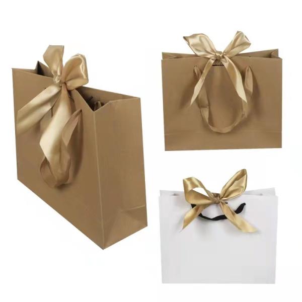 Bolsa de papel de luxo de compra de presente de papel impresso customizado bolsa de papel kraft marrom com o seu próprio logotipo para roupas joias