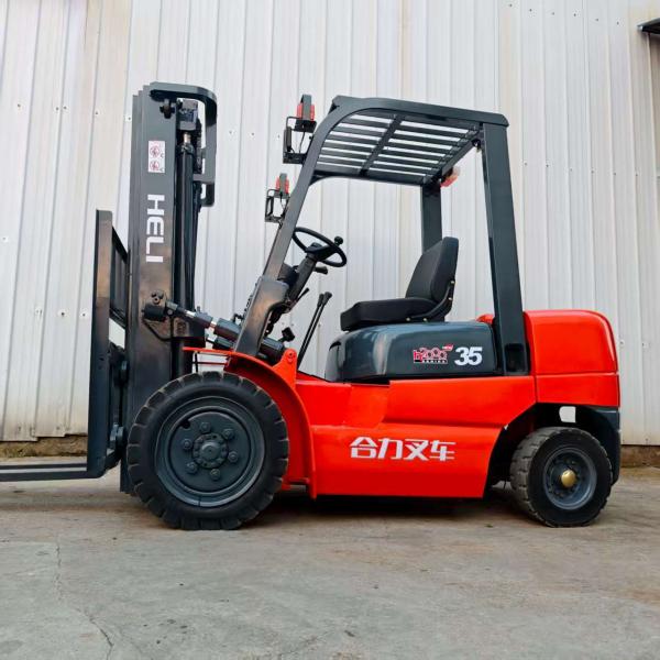 Second-Hand Heli 3.5 Ton 3-Mast Manual Forklift, High-Strength Steel Frame, Orange Color, Perfect for Heavy-Duty Material Handling in Industrial and Logistics Environments