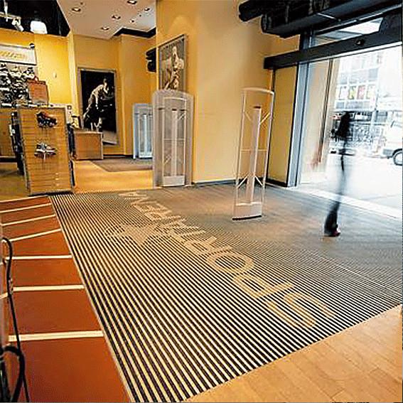 Tapis d'entrée en aluminium résistant au glissement pour bâtiments commerciaux à fort trafic
