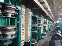 Machine de vulcanisation de capsules de pneus de moto