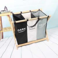 Le panier pliant se pliant réutilisable de blanchisserie pour des vêtements cogne le bois en bambou solide