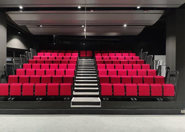 Indoor Cultural Center Retractable Bleachers With Soft Folding Chair Seating