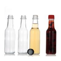 Bouteilles de sauce chaude cylindrique 5 oz avec capuchons et goutte-à-goutte