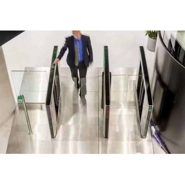 Swing Barrier Turnstile featuring automatic arm open on power off and delayed close for emergency and operational safety