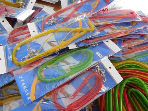 Big stock red plastic long fishing tackle leash spiral cord with snap hooks on two ends