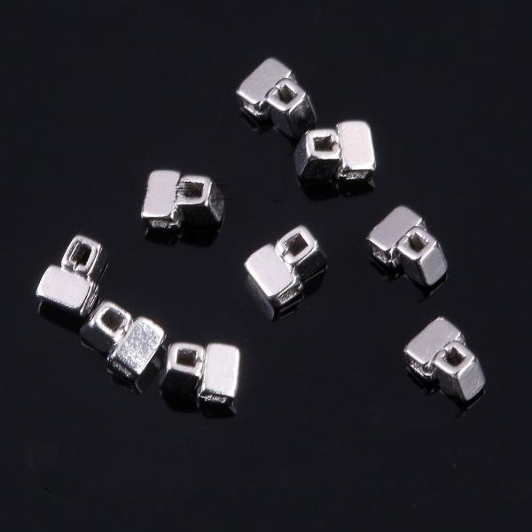 Dental ortodoncia gancho en forma de cuchillo de tubo cruzado/doble tubo ganchos de deslizamiento dividido para alambres de arco Vida útil 2 años por grado