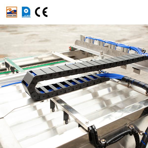 Automatic Cone Sleeving Device For Production Lines Operation In Food Processing Industries