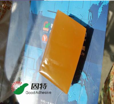 O amarelo e o esparadrapo quente semi-transparente do derretimento para envolvem a emenda da pressão quente de empacotamento do derretimento - esparadrapo sensível da colagem