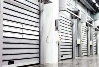 Puerta seccional de acero de doble piel con cerradura