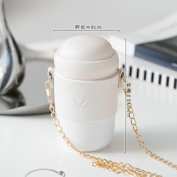 Stylish ceramic water bottle ceramic body gold-toned chain strap trendy design versatile style perfect for everyday