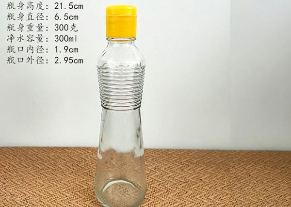 bouteille 500ml en verre transparente pour bouteilles d'huile/en verre au vinaigre avec le couvercle en spirale