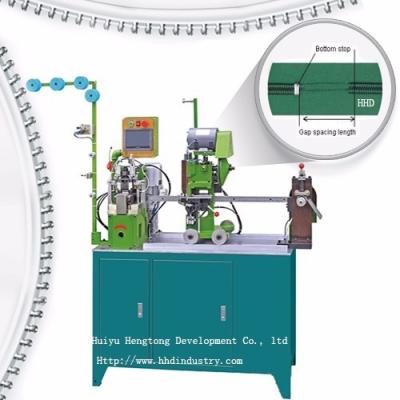 Máquina para separación de dientes y tope inferior de cremalleras de nylon automáticas