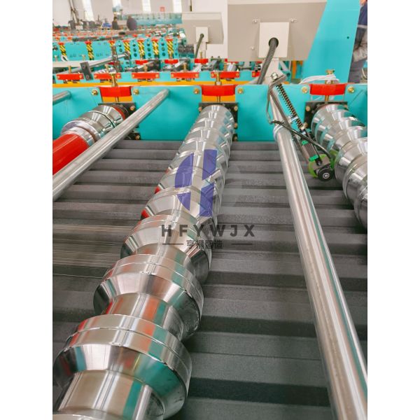 Trapezoidal Roof Sheet Roll Forming Machine with PLC Control System 40M/min Forming Speed and 23 Row Molding