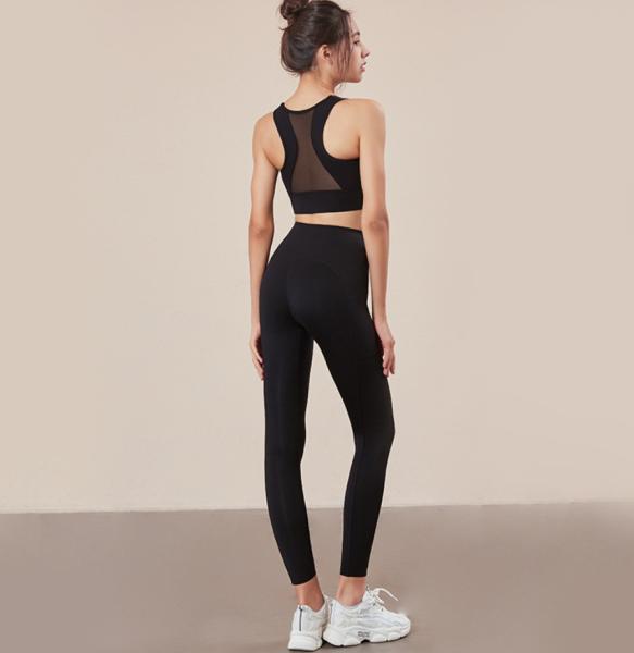 Calças sexy da ioga do Sportswear da aptidão e malha preta ajustada do sutiã dos esportes com bolsos