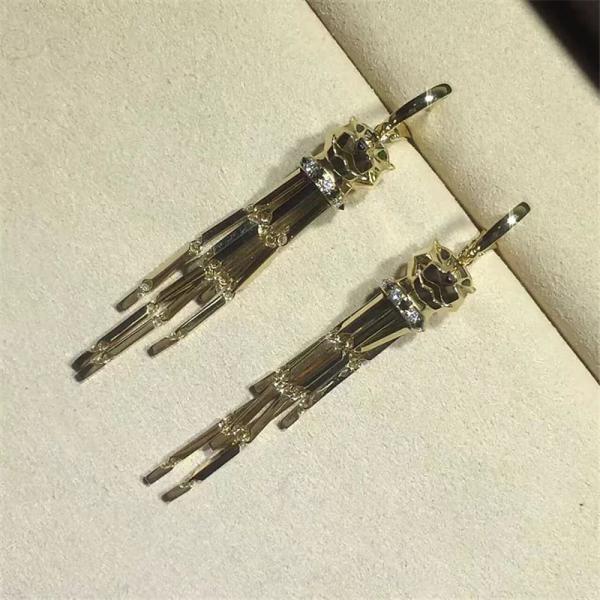 C Cheetah Earrings - showing the charm of courage, naughty or docile .18K gold, lacquer, diamond, shafle garnet, Onyx