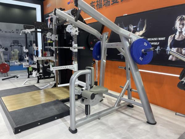 Équipement de gymnase commercial unisexe Machines chargées en plaque à l'intérieur Machines de traction lat en rangée haute avec extension arrière en acier