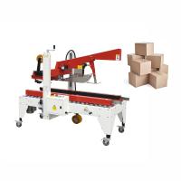 Le déballage et le cachetage inférieurs automatiques de boîte de carton de scelleur d'ODM déballent la machine