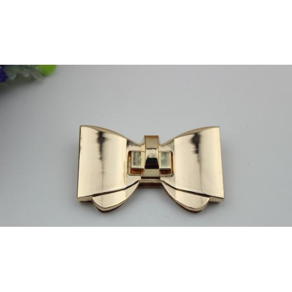 High polish gold metal bow-knot pattern zinc alloy fashion twist turn locks for purse