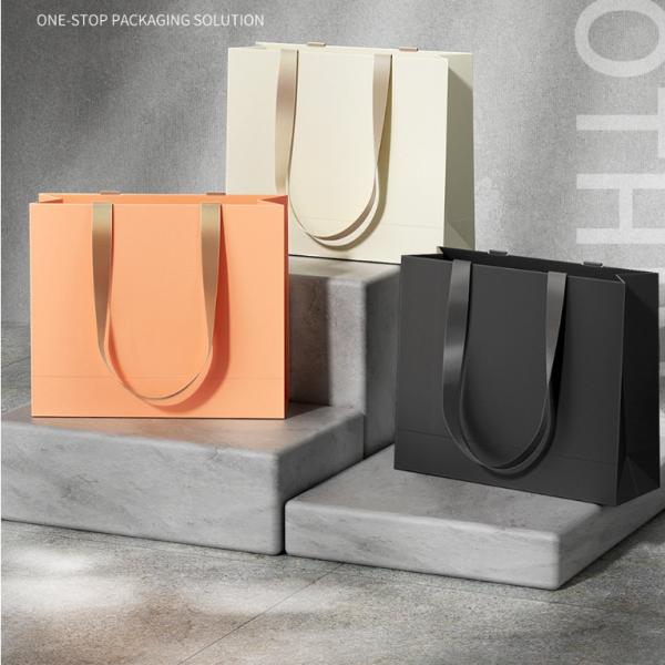Custom Clothing Shopping Bags Packaging Luxury Ivory Board Kraft Paper Shopping Gift Bag Custom Logo