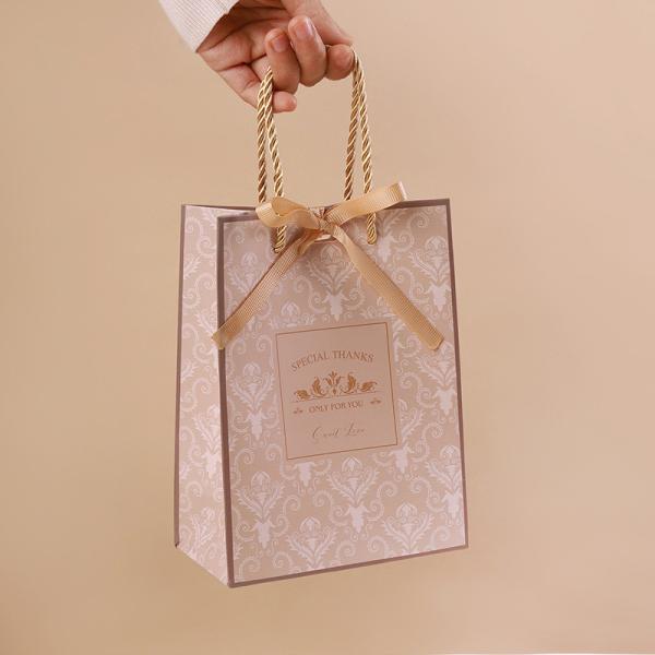 Cattle Paperboard Custom Kraft Paper Handbag Cosmetics Packaging Gift Bags With Cowhide Rope