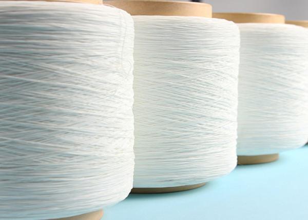 Branco cru do fio desencapado alto do Spandex do tecido da tenacidade 560D para produtos do bebê