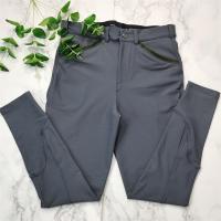 Collants d'équitation de silicone de genou pour le pantalon équestre de tissus techniques à séchage rapide des hommes