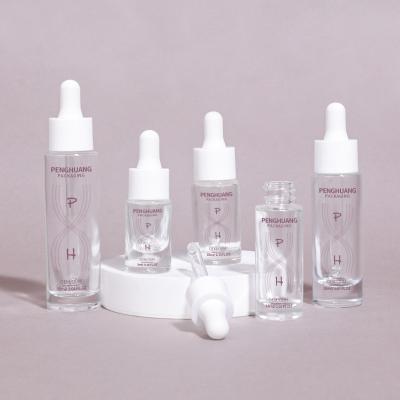Custom Logo Transparent Oil Dropper Glass Bottle For Serum Hair Oil