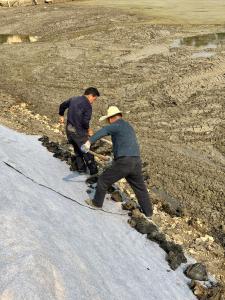 Cement Infused Geosynthetic Blanket (CCB) Deploy. Hydrate. Harden.