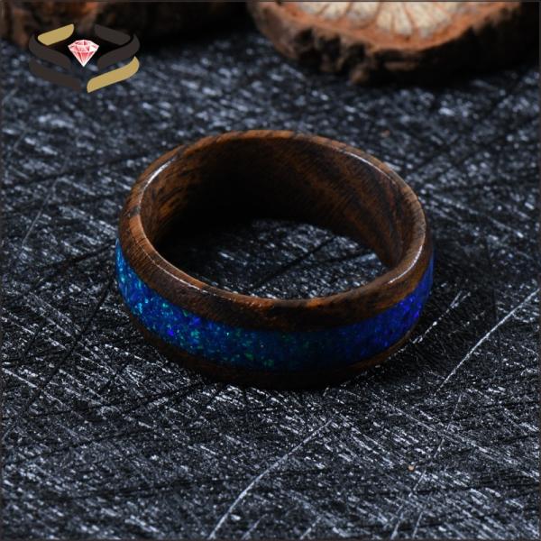 Anillos de madera de ébano dorado tipo perla de 8 mm con incrustaciones de ópalo azul