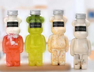 A bebida plástica do produto comestível engarrafa 23.3oz Squeezable 16 onça Honey Bear Bottles