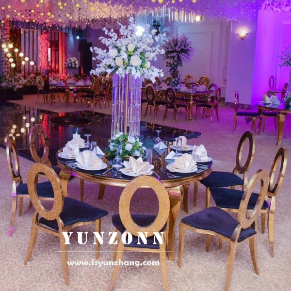 Louis Modern Round Marble Dining Table with Polished Gold Stainless Steel Serpentine Legs for Hotels or Living Rooms