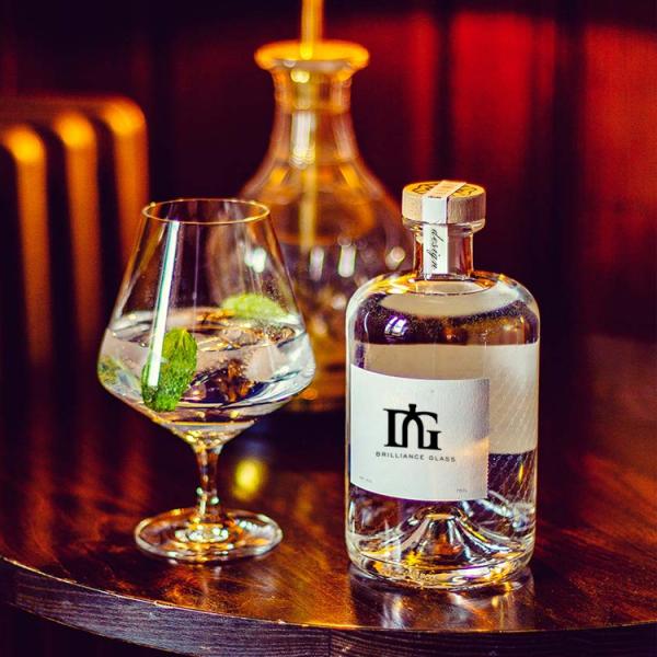 Acceptable Customer's Logo 750ml Round Shape Flask Glass Spirits Bottle With Cork Lid