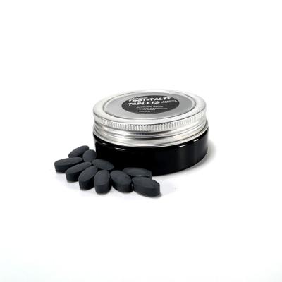 Os dentes que saudáveis da pastilha de hortelã o dentífrico marca Antiplaque desperdiçam tabuletas livres do dentífrico