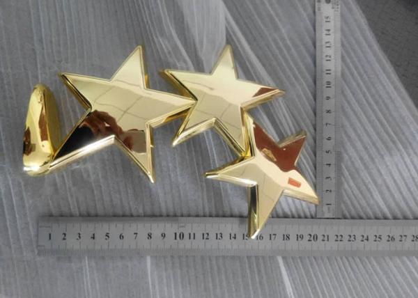 O copo feito sob encomenda do troféu da estrela do metal, ouro brilhante chapeou troféus dos copos da concessão
