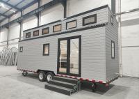 Chambre minuscule préfabriquée en acier légère avec le mur et la remorque de panneau 