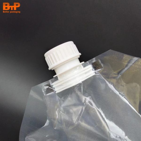 Custom Reusable Stand up Pouch With Plastic Handle With Nozzle Plastic Liquid Beverage Juice Drink Packaging Plastic Bag
