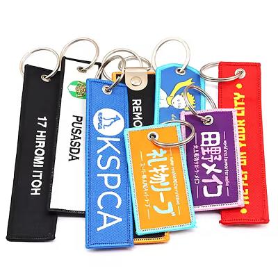 Wholesale Custom Design Embroidered Cloth Fabric Woven Keychain Special Item