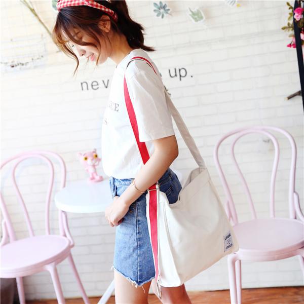 New canvas small ring shoulder Messenger bag simple portable leisure Joker bag women